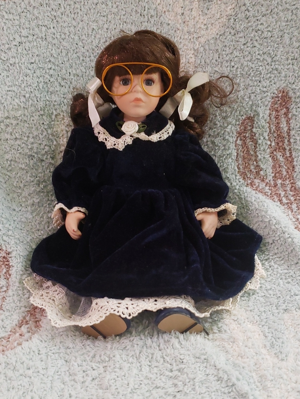 Source Unknown Porcelain Doll in Navy Velvet Dress with Yellow Glasses